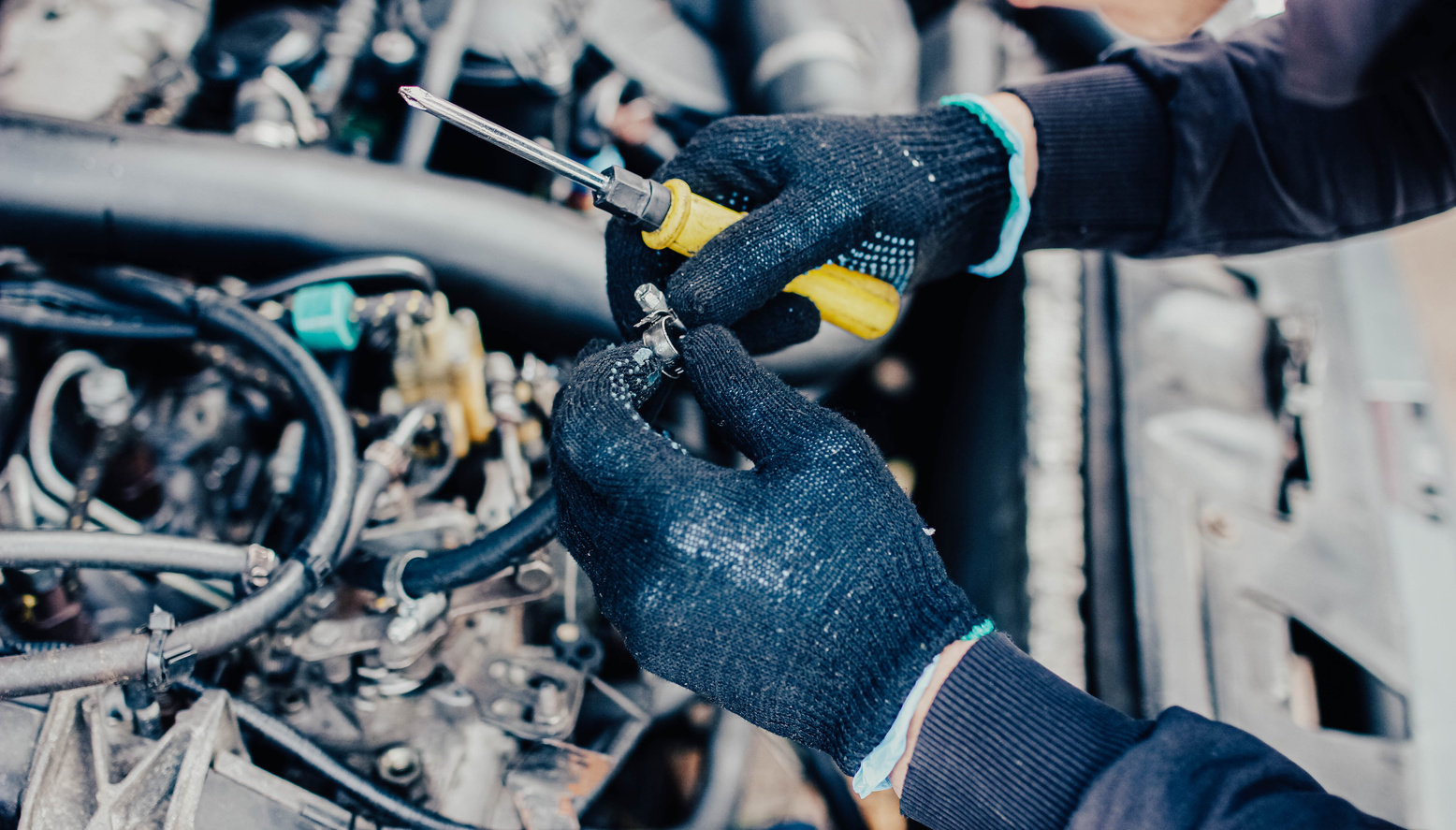 car fuel system repair, hose replacement.