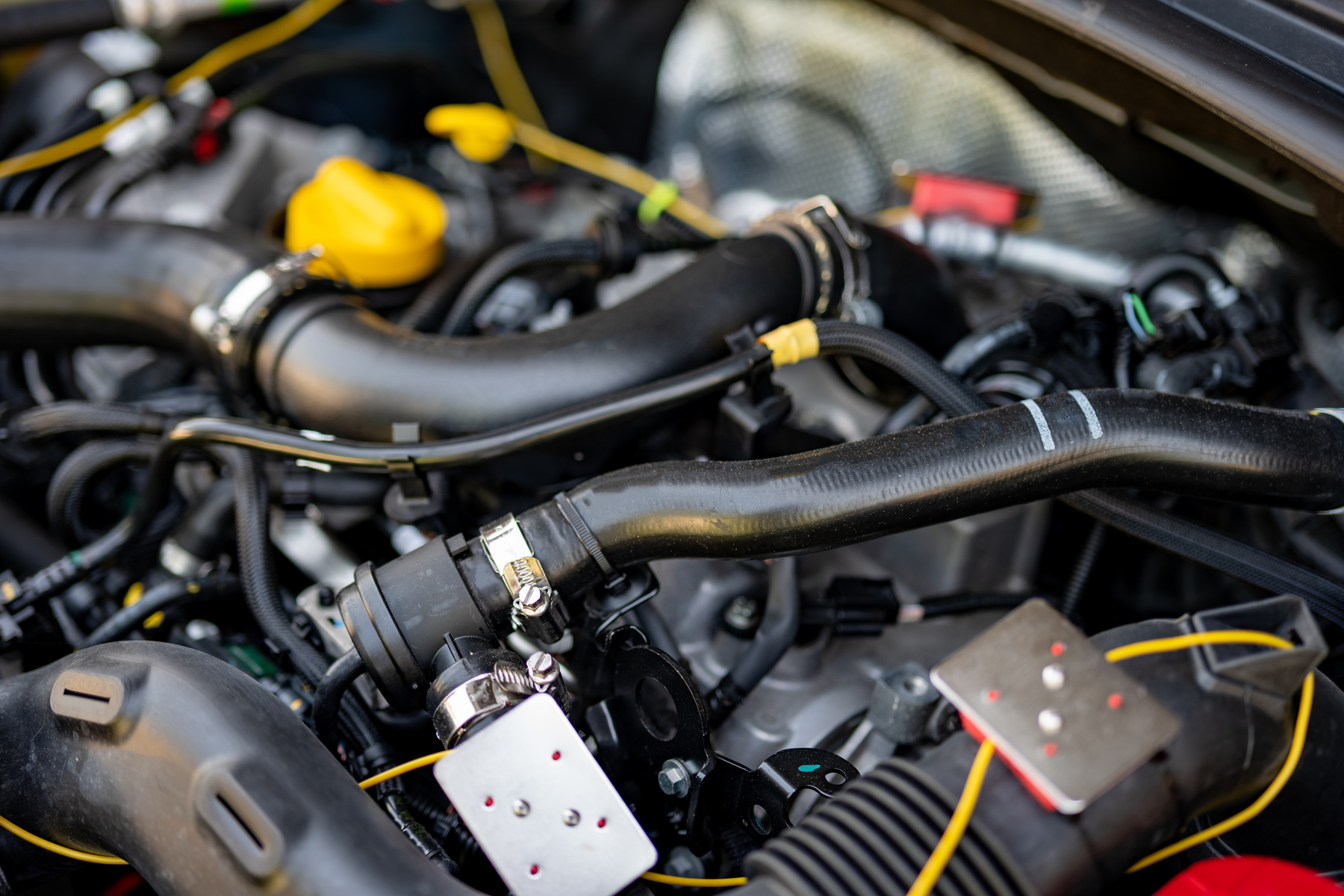 a car engine with hoses